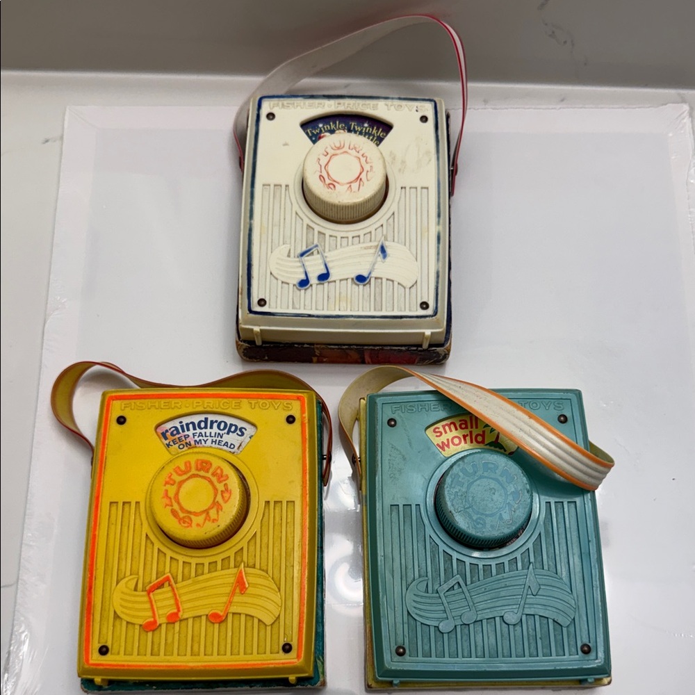 Fisher Price Vintage Pocket Radio Musical Toy Trio